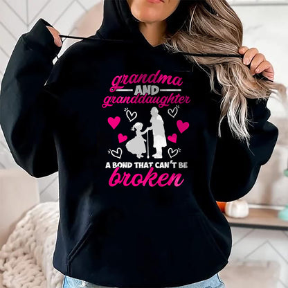Best Grandma Shirt, Proud Grandma Unisex T-Shirt/Hoodie/Sweatshirt HLT00 - Cute Grandma And Granddaughter A Bond That Can't Be Broken T-Shirt